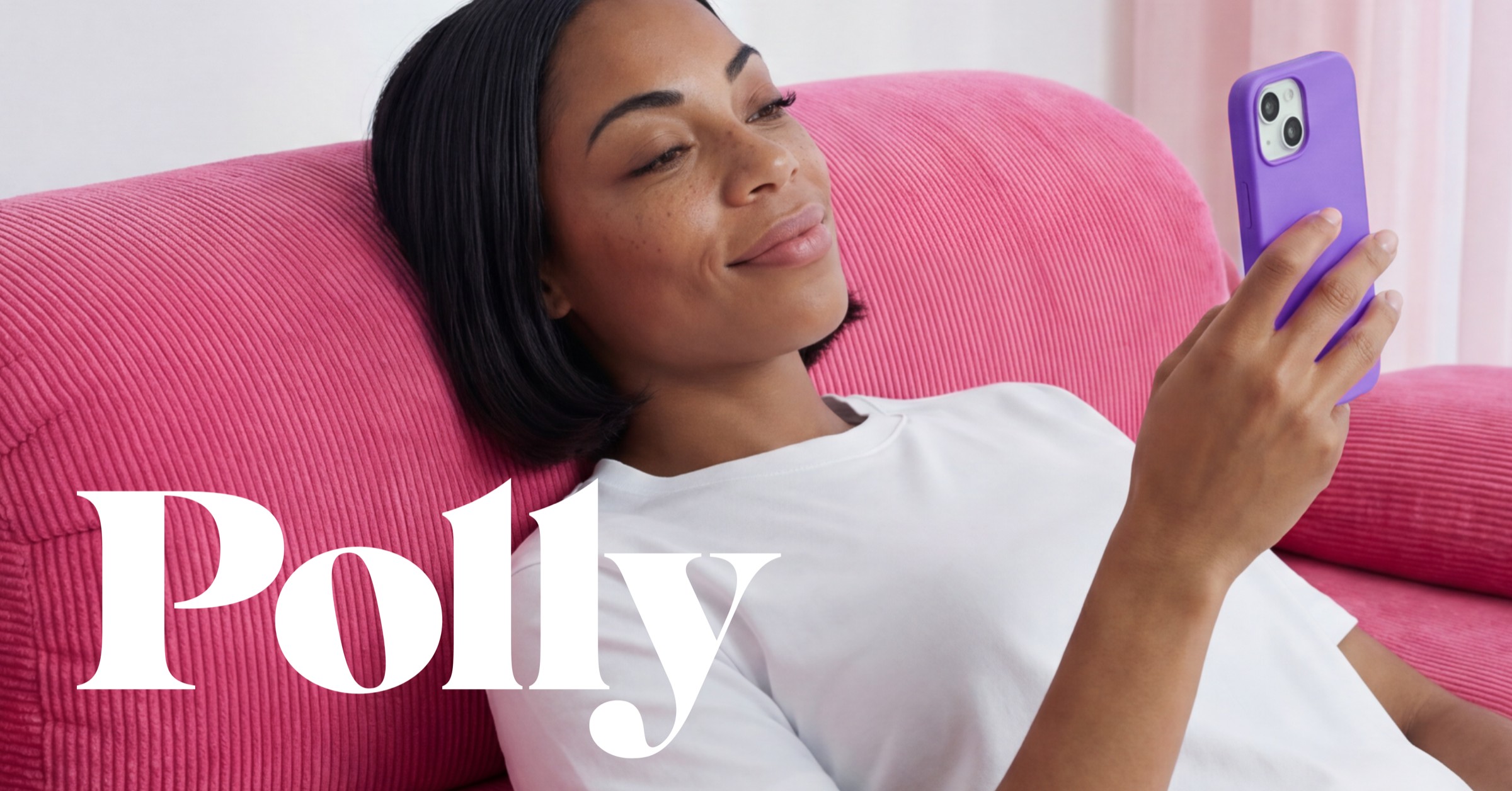 Polly lifestyle — woman on sofa with purple phone